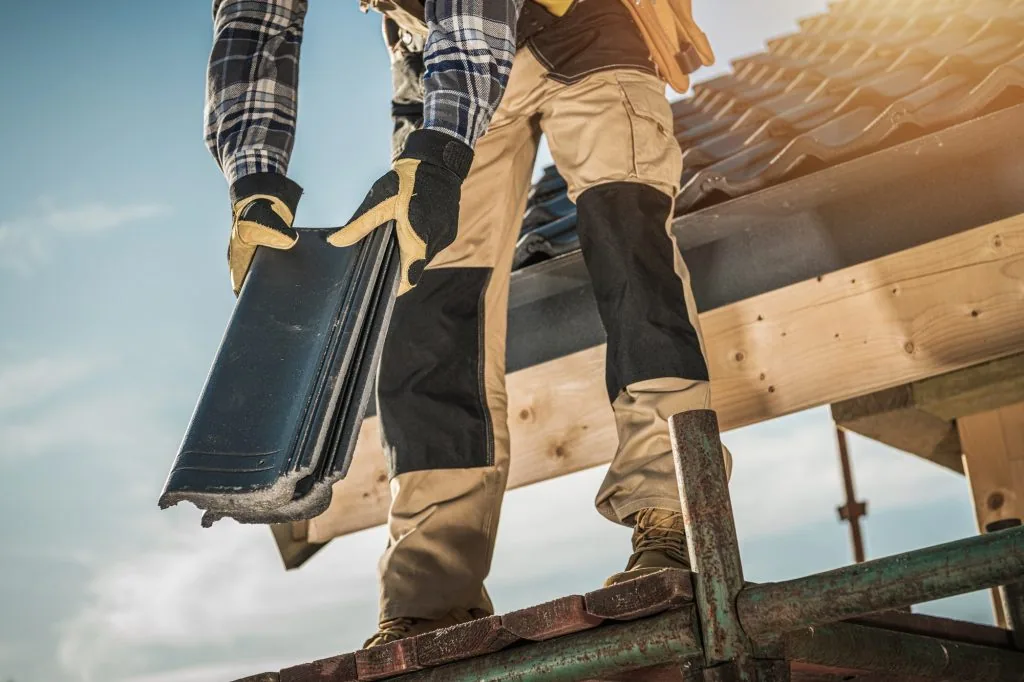 roofer-with-ceramic-tiles-1024x682-1.opt.webp